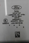 Picture of the label aka the BUG on the lower portion of the front windshield. 
    DW02131GTY interchange DW02354GTY OEM Carlite/Carlex Ford Brand.  Glass is Acoustic.
