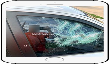 The photo is from an attempted break-in.  The laminated door glass prevented the theft from getting inside of 
this car.