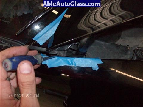 Acura RL 2005-2008 Windshield Replaced - tab release of cowl and wiper cover