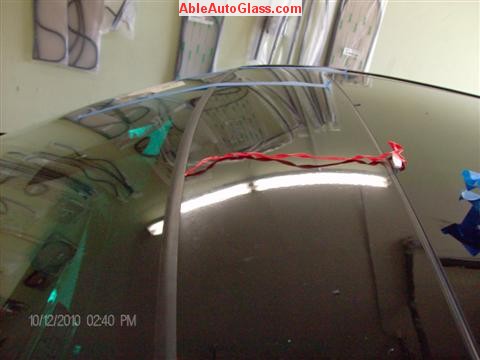 BMW 5451 2005 Windshield Replace Houston, TX-Pulling Tap off Top Molding