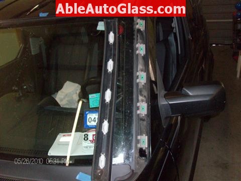 Honda Element 2010 Windshield Replace - Close-up of Clips