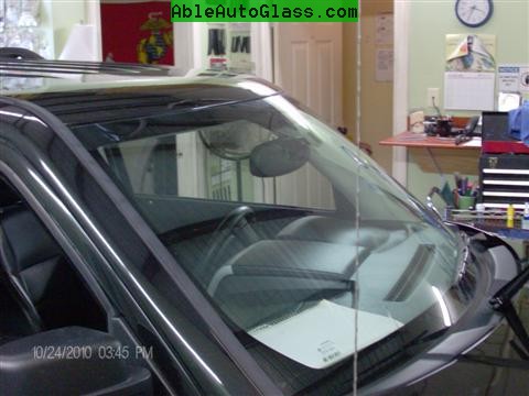 Jeep Patriot 2007-2011 Windshield - Replacement - View of Paper Under Bug (