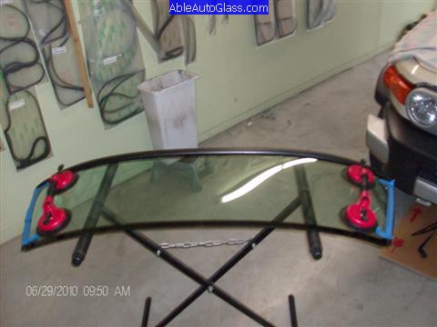 Toyota FJ Cruiser 07-10 Windshield Replacement 2 Suction Cup and Side Molding Applied to Glass