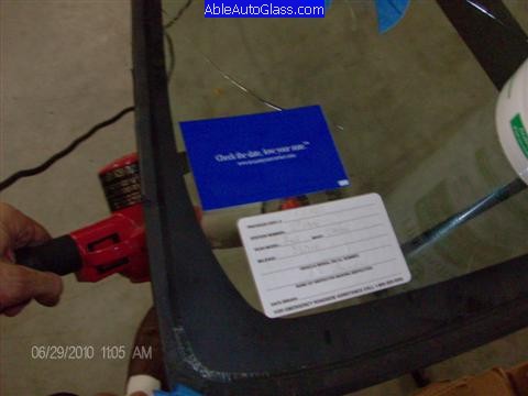 Toyota FJ Cruiser 07-10 Windshield Replacement Heating Up Old Stickers to Transfer to New Windshield
