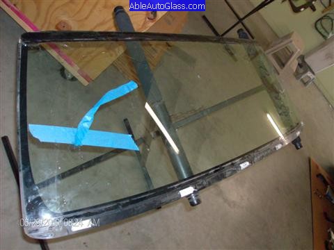 Toyota FJ Cruiser 07-10 Windshield Replacement Old Windshield on Stand